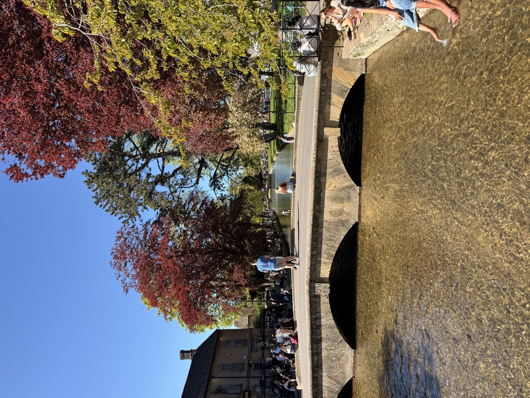 Cotswolds village bridge over a shallow river